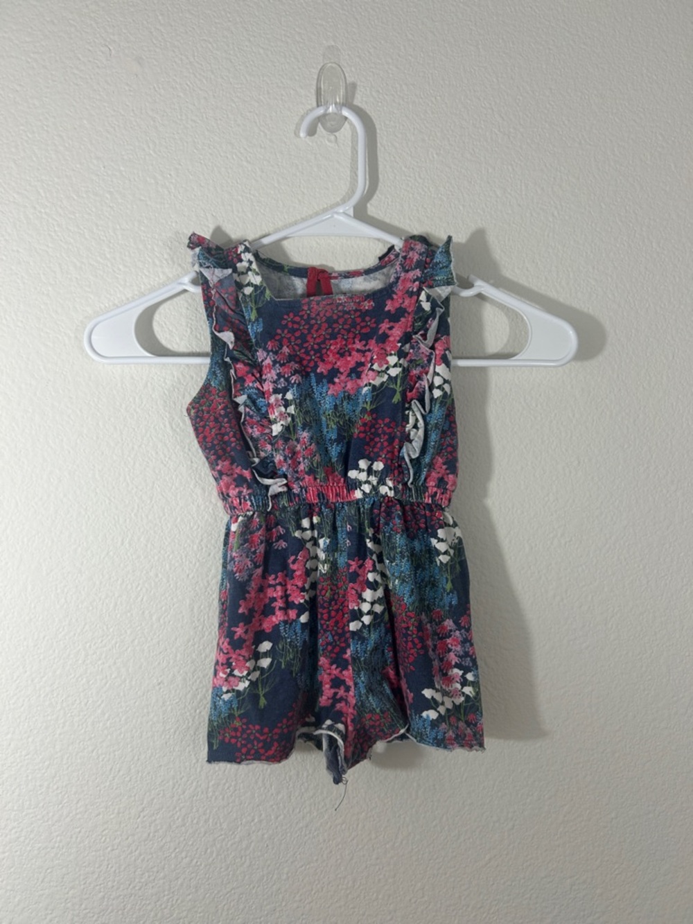 Burt's Bees Navy Floral Ruffle Romper with Pink & White Blooms